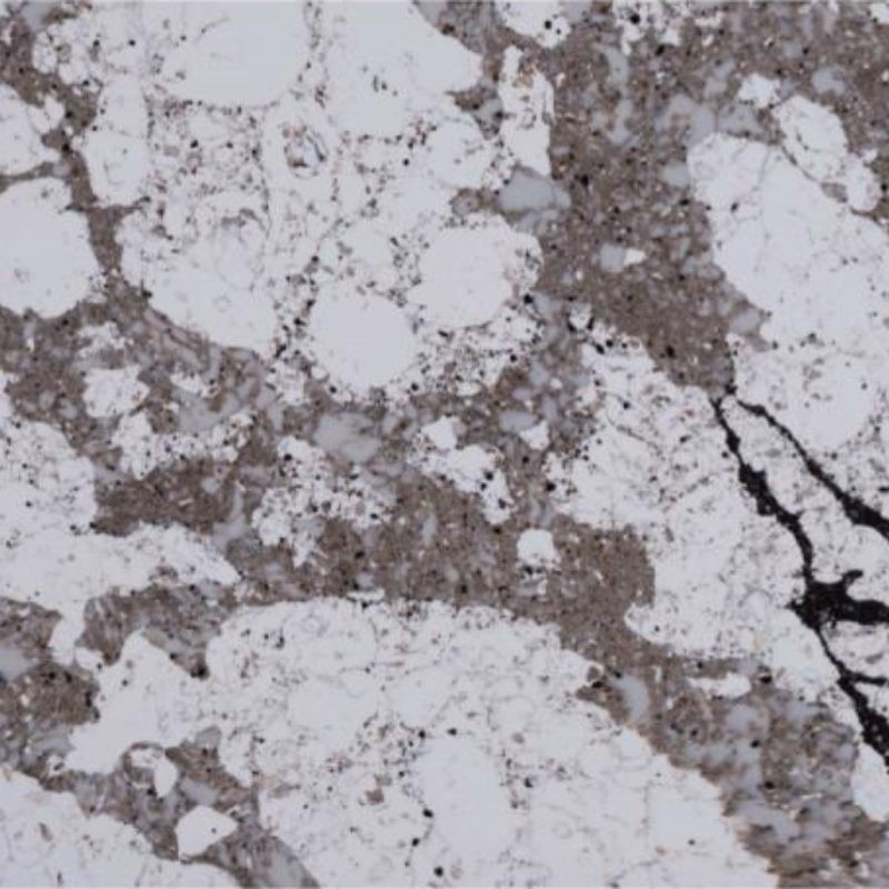 Una encimera de cuarzo sólido de varios colores que parece mármol y granito
