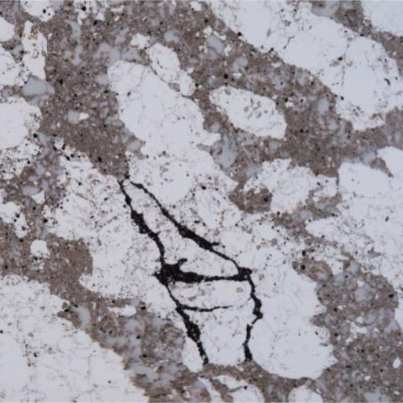 Una encimera de cuarzo sólido de varios colores que parece mármol y granito