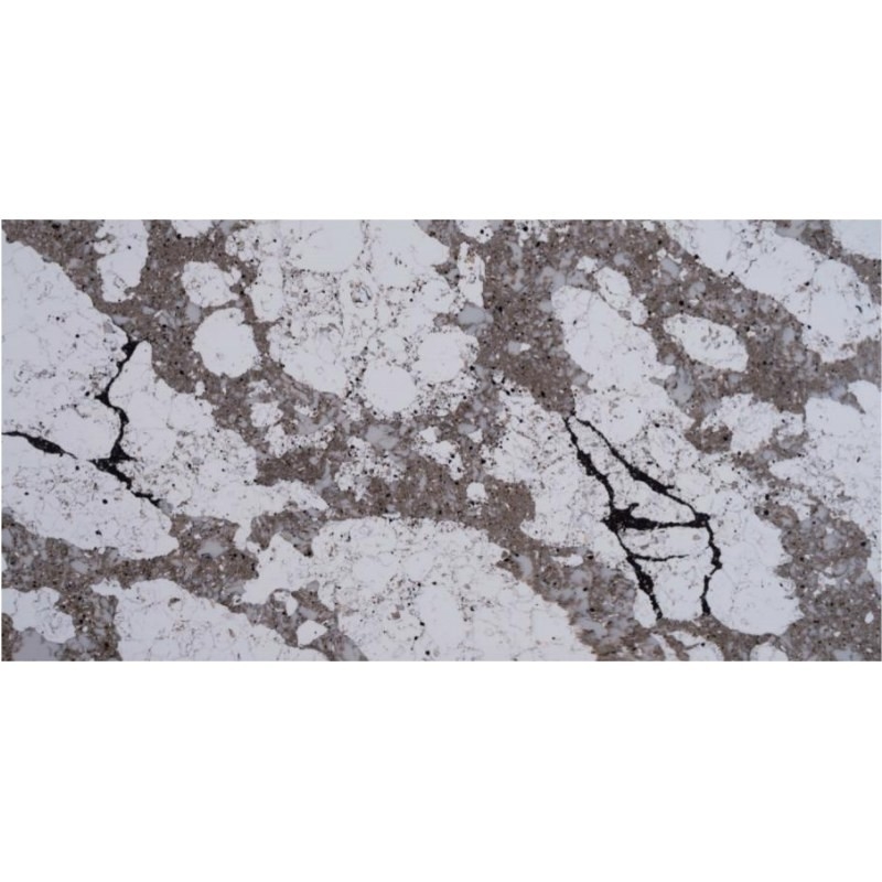 Una encimera de cuarzo sólido de varios colores que parece mármol y granito