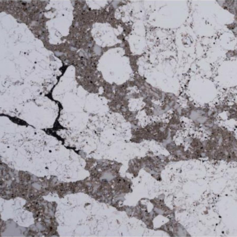 Una encimera de cuarzo sólido de varios colores que parece mármol y granito